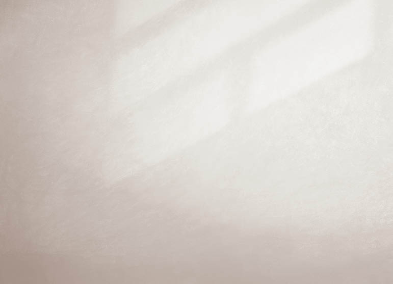 Gray wall in an empty room with concrete floor