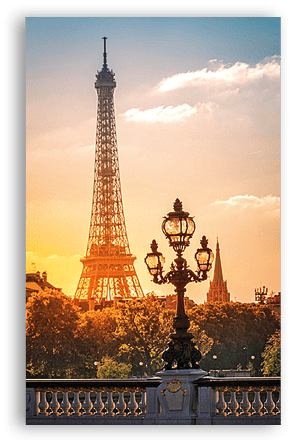 Street lantern on the Alexandre III Bridge against the Eiffel Tower in Paris, France