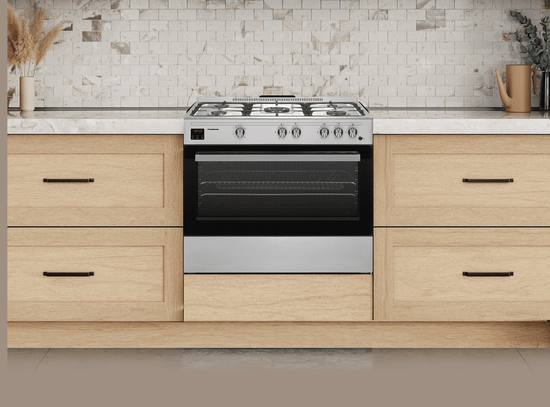 Microwave oven and gas sove in wooden kitchen