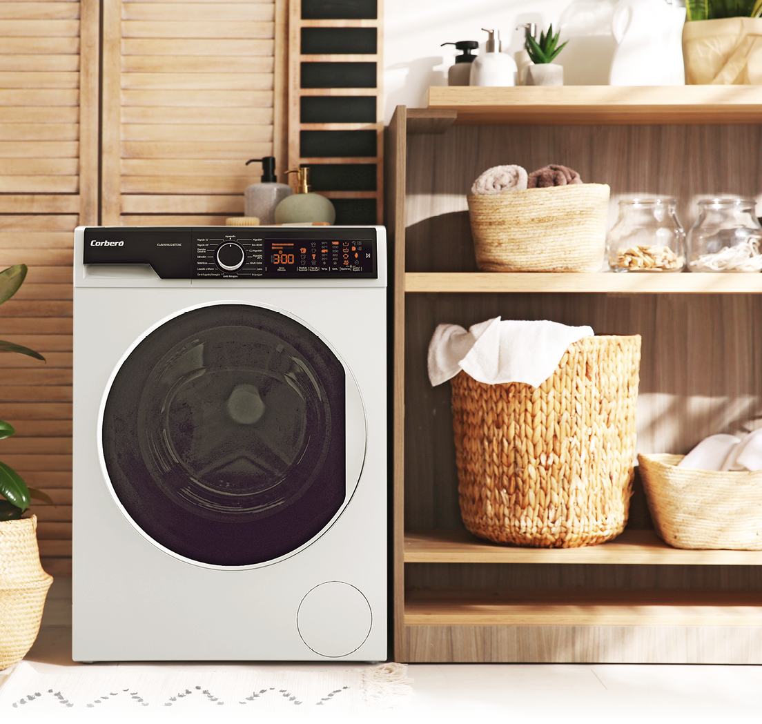Modern washing machine and shelving unit in laundry room interior