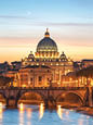 Rome, Italy - April 13, 2013 : St. Peter's Basilica in Vatican City and Ponte Sant Angelo in evening.