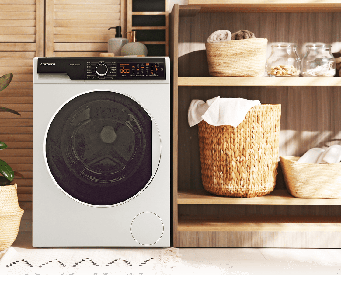Modern washing machine and shelving unit in laundry room interior