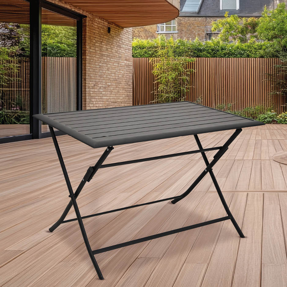 Exterior view of a back garden patio area featuring wood decking, ideal for outdoor living spaces.