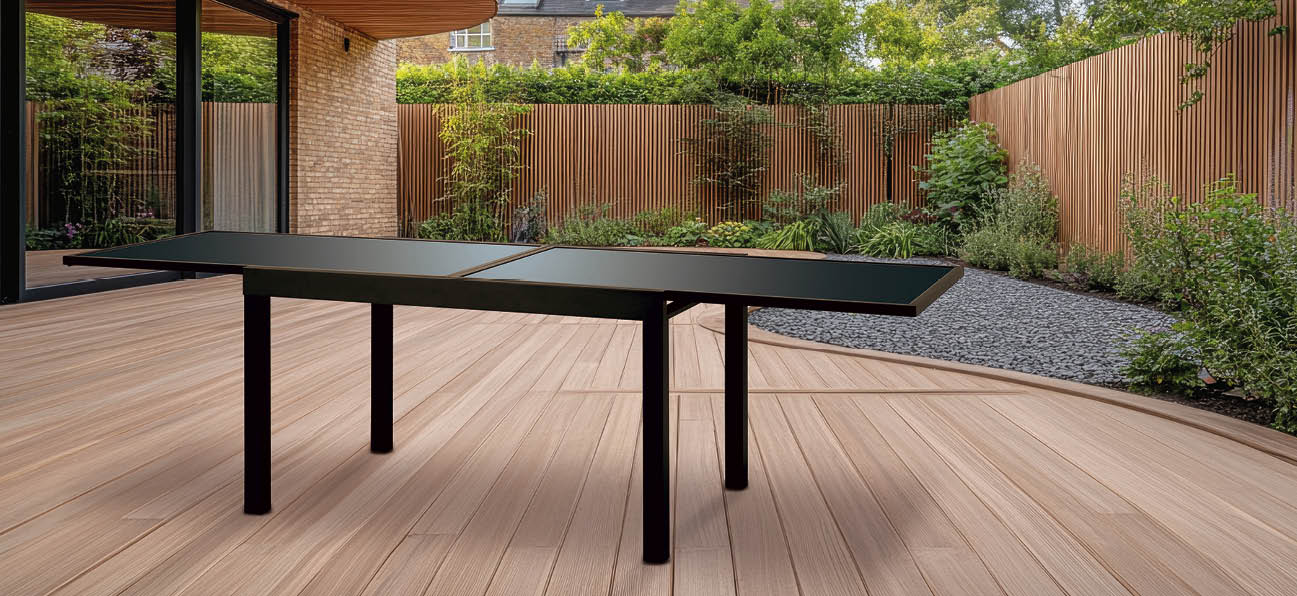 Exterior view of a back garden patio area featuring wood decking, ideal for outdoor living spaces.
