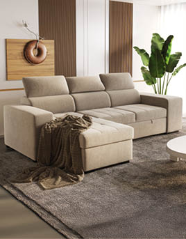 A large couch with a blanket on it is in a living room with a potted plant and a laptop. AI generated content