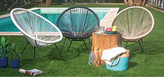 A patio set is placed on a grassy area with a pool in the background. AI generated content