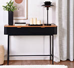 A black table with candles and a picture on it. AI generated content