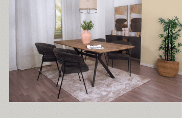 A dining room with a wooden table and chairs. A potted plant is on the table and a vase with flowers is on the floor. AI generated content