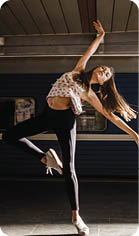 Caucasian woman dancing near train