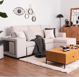 A living room with a blue couch, a coffee table, and a mirror. The room is decorated with a rug, a potted plant, and a bowl. AI generated content