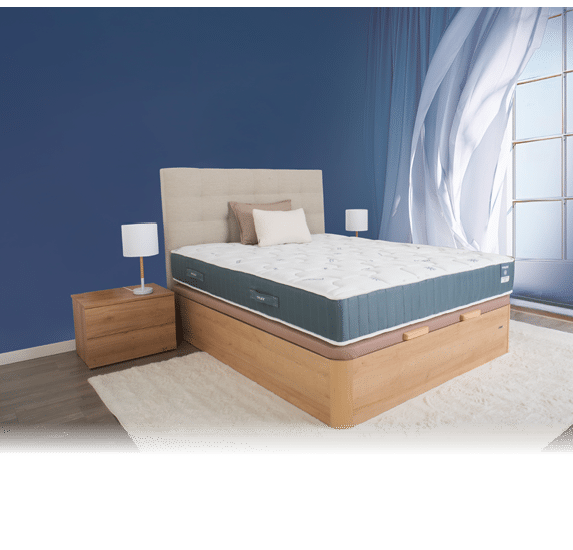 A bed with a wooden headboard and a blue comforter. AI generated content