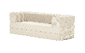 A white couch with a wicker design. AI generated content