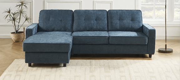 A gray couch is in a living room with a window above it. The room also contains a chair, a vase, and a potted plant. AI generated content