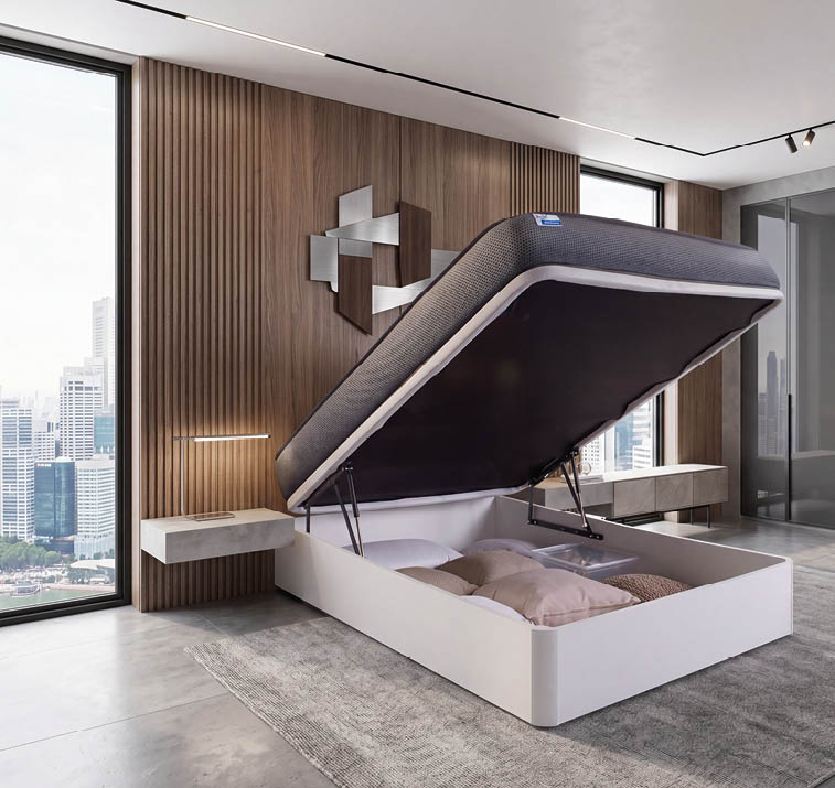 A bed with a white mattress and a grey cover. AI generated content