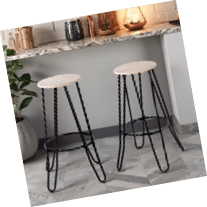 Two black and white stools are placed on a marble countertop. AI generated content