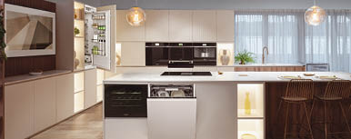 A modern kitchen with white appliances, a center island, and a large window. AI generated content