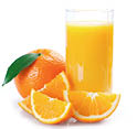 A glass of orange juice is placed next to a sliced orange. AI generated content