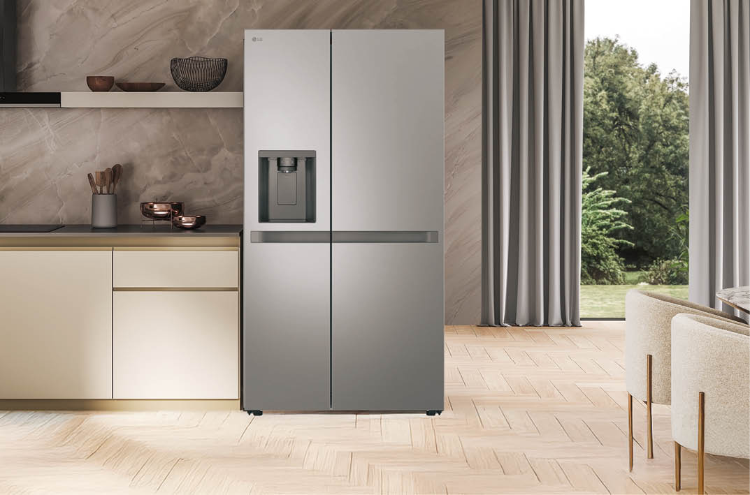 A kitchen with a stainless steel refrigerator and a marble countertop. AI generated content