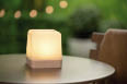 A small white light on a table. AI generated content