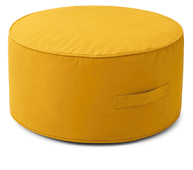 A yellow round ottoman with a brown pattern on it. AI generated content