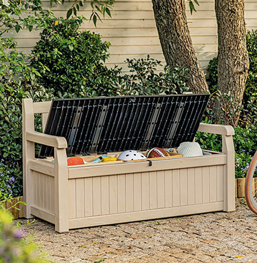 A bench with a solar panel on top of it is next to a bicycle. AI generated content