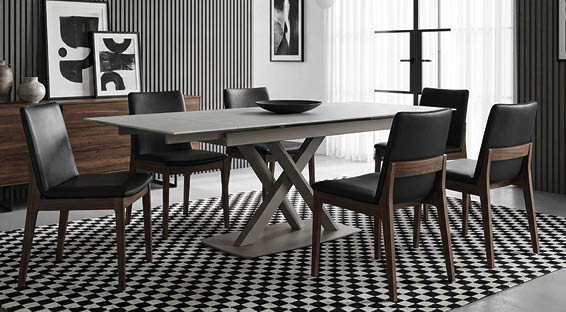 A modern dining room with a white table and chairs. AI generated content