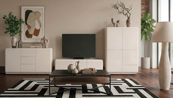 A living room with a flat screen TV, a coffee table, and a couch. A potted plant and a vase are also present in the room. AI generated content