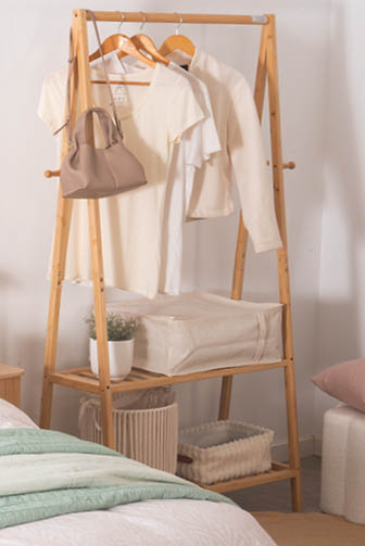 A shelf with a white basket and a plant on it. AI generated content