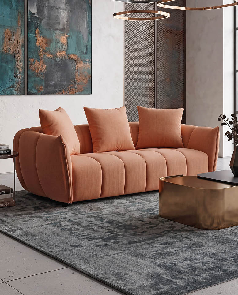 A large, tan couch with pillows on it is in a living room. AI generated content